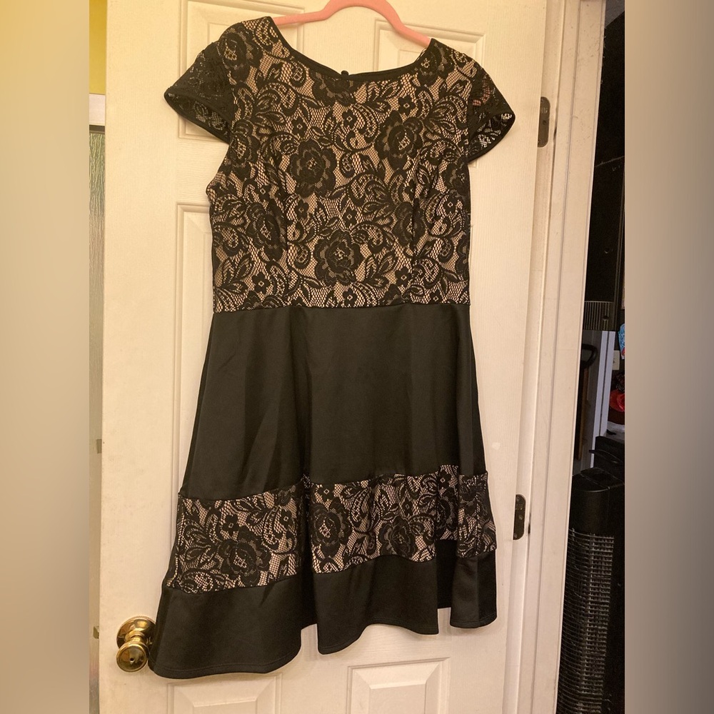 Karin Stevenโs, size 16, black floral dress. Pretty and comfortable.